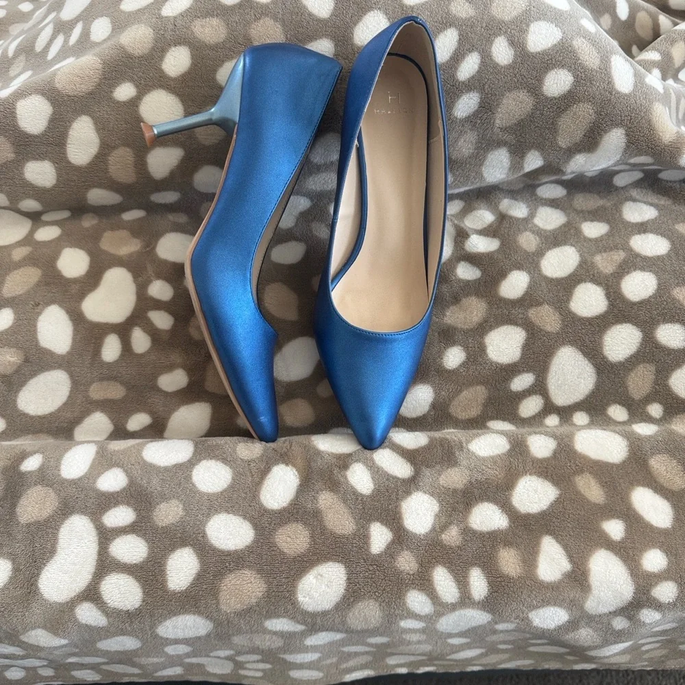 Vintage inspired elegance by Halston.  Vegan leather, rubber sole.